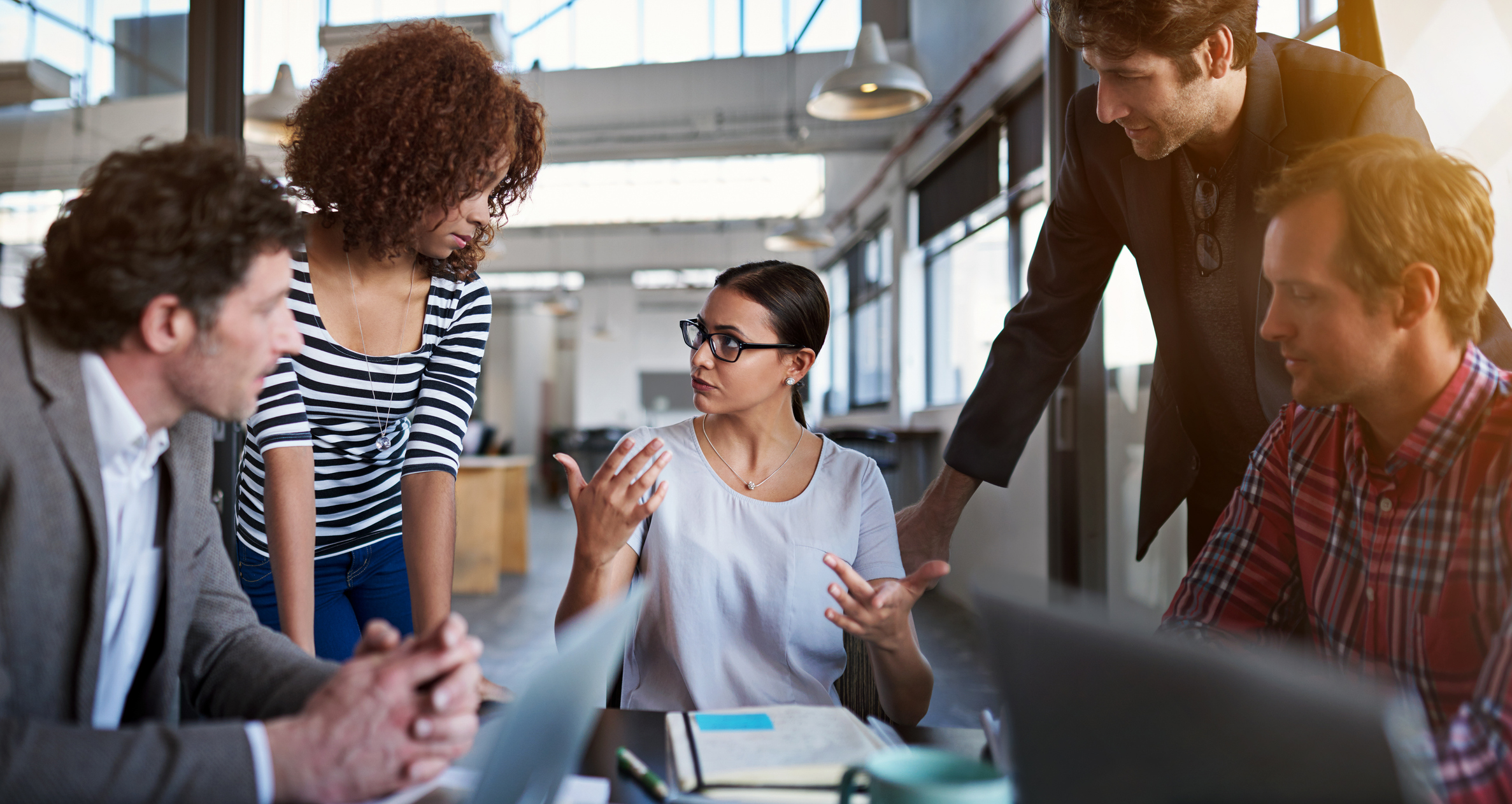 Competent boss talking to team